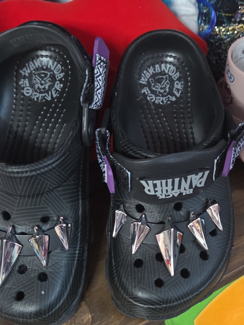 CROCS Kids Black Clog Sandals with Purple Strap Accents